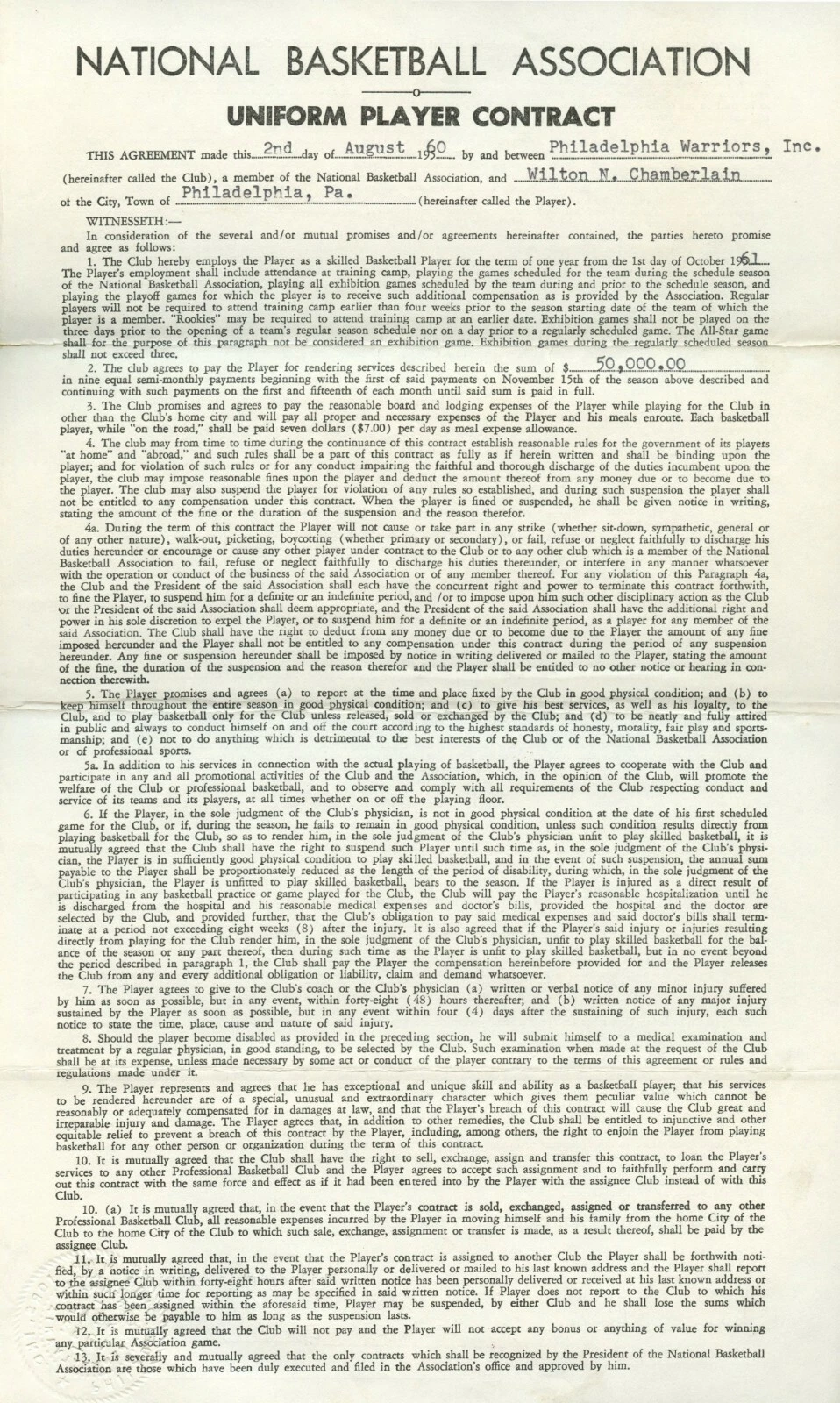 Signed 1960-61 Wilt Chamberlain Philadelphia Warriors rookie contract document displayed in protective holder.